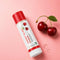 Lip balm with cherry design on a pink background