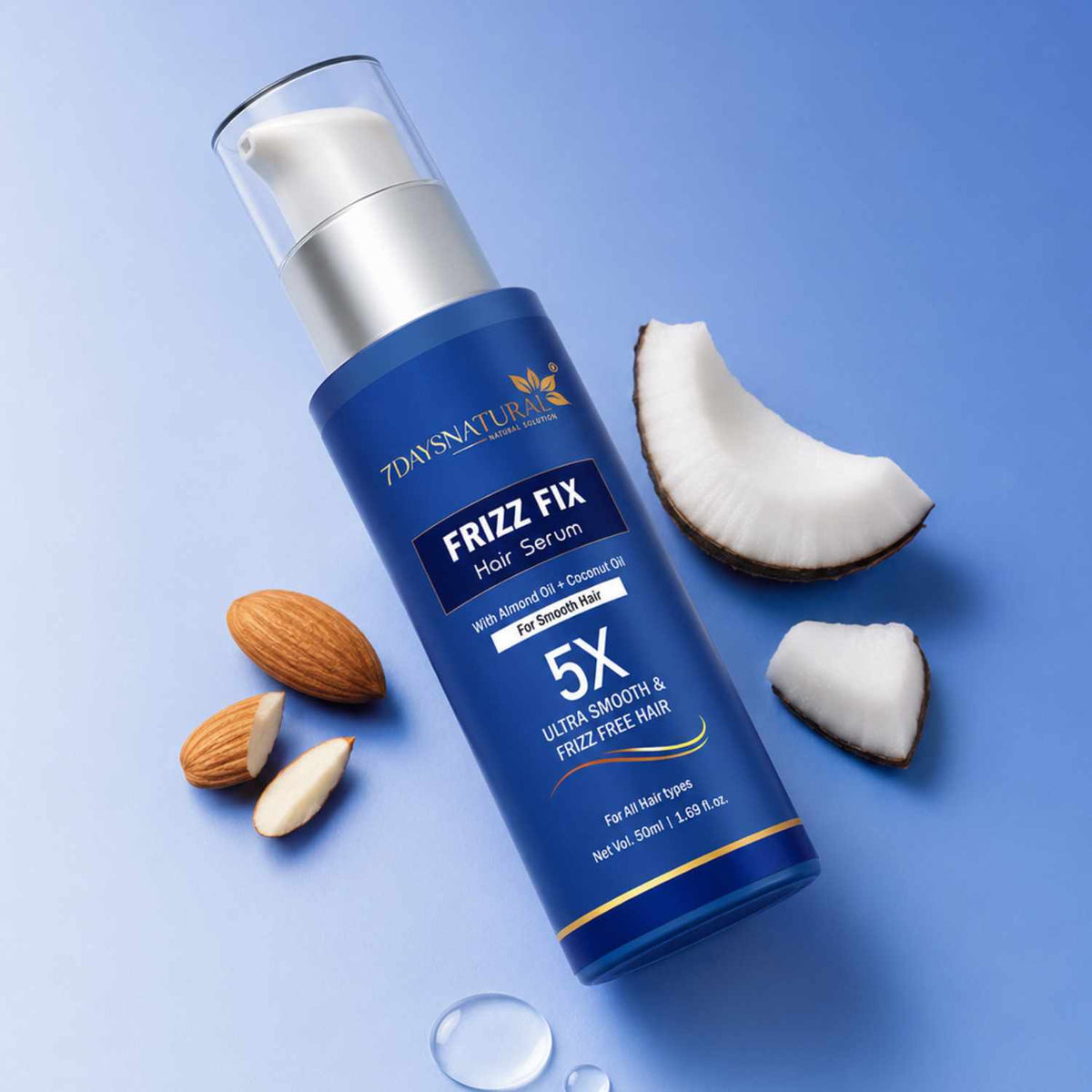 ZDays Natural Frizz Fix hair serum bottle with coconut pieces and almonds on a blue background