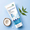Tube of 7 Days Naturals Bye-Bye Chafing Cream with coconut and leaf on a light blue background