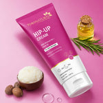 Tube of 'Hip-Up Cream' with ingredients on a pink background