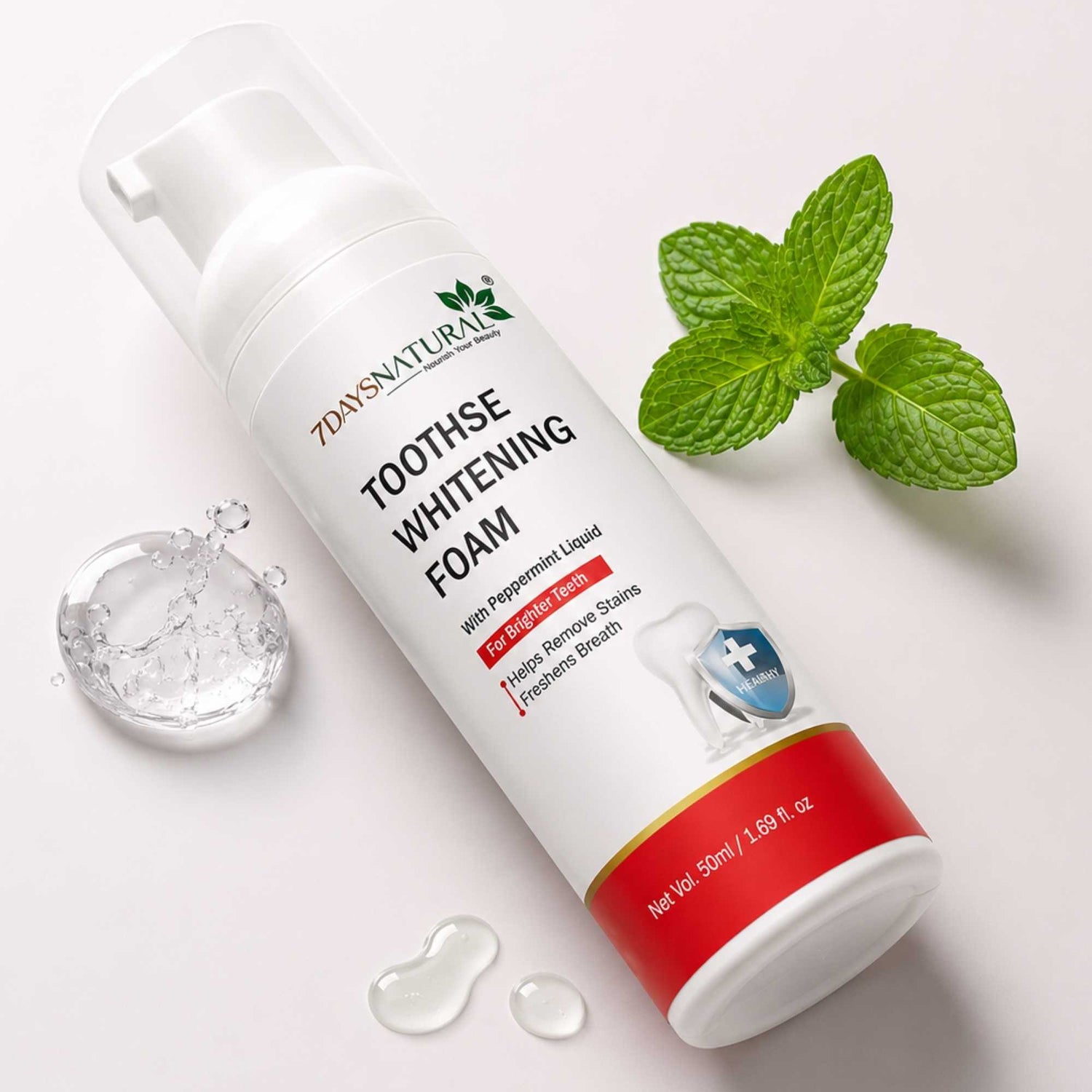 Toothpaste tube labeled 'Toothse Whitening Foam' with mint leaves on a light background